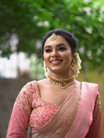 Ganavi Uma - Hair Styling & Treatments Elegant Bridal & Event Updos photo 5