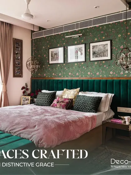 This bedroom is a sanctuary crafted with distinctive grace. The rich green velvet headboard, custom floral wallpaper, and unique pendant lights create a space that feels like a personal staycation, blending opulence with tranquility.