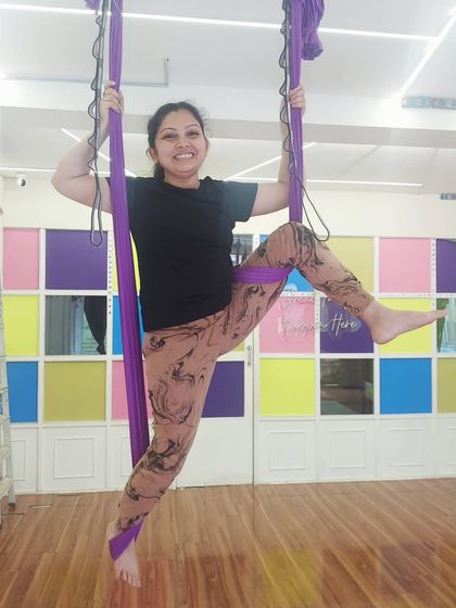 A student having a great time during a "crazy ass routine." The smiles and laughter make all the hard work worth it.