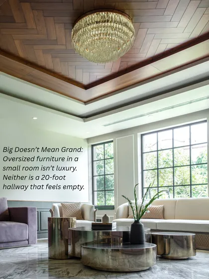 Big doesn't always mean grand. Oversized furniture in a small room isn't luxury, and neither is a vast, empty hallway. Proportion is about finding the right scale for the space.