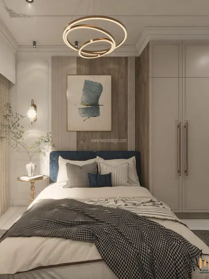 A guest bedroom with a neoclassical theme, using a soothing palette of beige and white with royal blue accents for a tranquil and sophisticated feel.