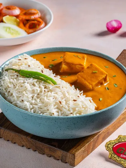 A classic Paneer Makhani and rice bowl from Gulab Sweets.