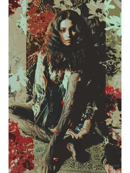 A highly stylized, graphic image from 'Roots'. The model, dressed in patterned layers and textured tights, is set against a floral backdrop, creating a rich tapestry of patterns that speaks to cultural fusion.
