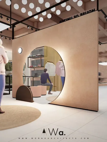 A conceptual design for an apparel store in Noida, featuring a large, illuminated circular entryway that creates a unique focal point. This project highlights our approach to retail design, where we use architectural elements to craft a distinct brand experience.