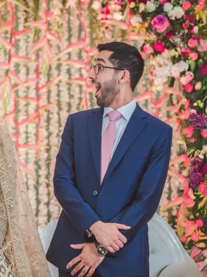 The groom's priceless reaction of surprise and awe upon seeing his bride. Capturing these spontaneous, emotional moments is at the heart of my wedding photography style.