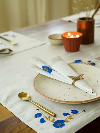A collection of our product photography for various home decor and tableware brands. These shots display a range of items including placemats, table runners, ceramic bowls, plates, vases, bar tools, and candles, all styled to perfection.