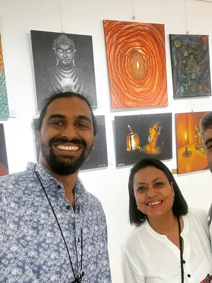 More smiling faces at the art show.