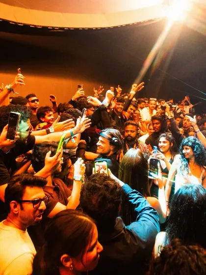 This is the VIP experience I create. You're not just watching the show, you're part of it, right in the middle of the action with the artist. Here's Argy surrounded by the crowd in an exclusive, up-close moment.