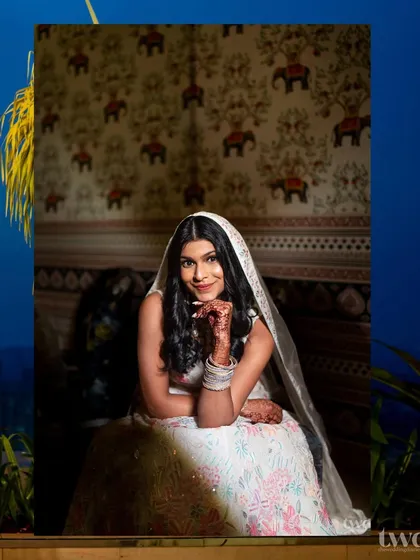 A beautiful, serene portrait of the bride Neharika, with a lovely hint of her intricate henna.
