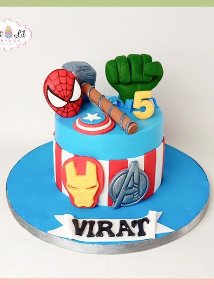 An Avengers-themed cake that packs a punch. This design brings together symbols of Iron Man, Captain America, Thor's hammer, and Hulk's fist for a powerful 5th birthday celebration.