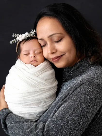 There is nothing more peaceful than a mother holding her newborn. In my studio, I create a calm space to capture these tender, quiet moments between you and your baby.
