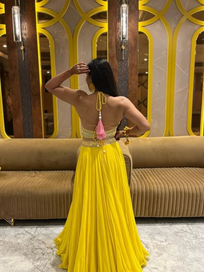 Showing off the back gains. Building muscle is something to be proud of, and it looks amazing with traditional outfits.