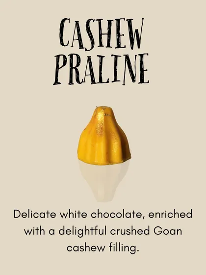 Our Cashew Praline modak is a tribute to local flavors, with a white chocolate shell and a filling of crushed Goan cashews.