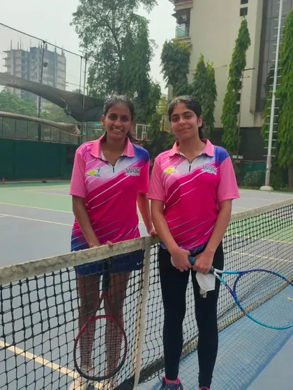 Finalists of the Women's Singles event posing at the net before their match. We ensure a professional setup for all key matches.