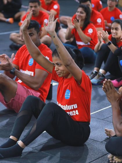 The pure joy of competition. An athlete celebrates after a tough event at The Bengaluru Throwdown 2024, supported by the applause of her peers.
