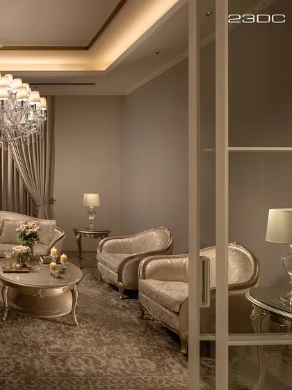 A different angle of the same room highlights the classic curved furniture and soft, ambient lighting. The space is a harmonious blend of luxurious fabrics, intricate details, and a calm, neutral color palette.