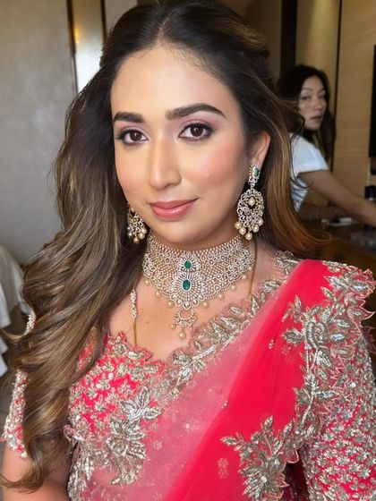 A final portrait of this stunning bride. The makeup is fresh and radiant, ensuring she looks as good at the end of the night as she did at the beginning.