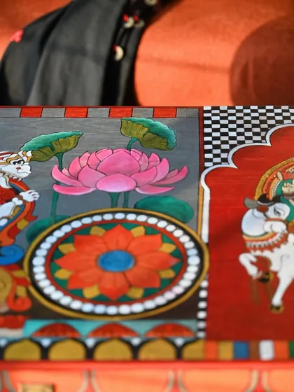 Another perspective on the side panel, showing the interplay of color and form. The combination of the Yali, the lotus, and geometric borders creates a rich visual texture.