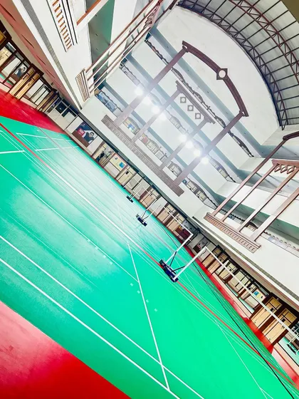 A look at our professional training ground. We have multiple well-lit, high-quality indoor courts that provide the perfect environment for focused, year-round badminton coaching without distractions.