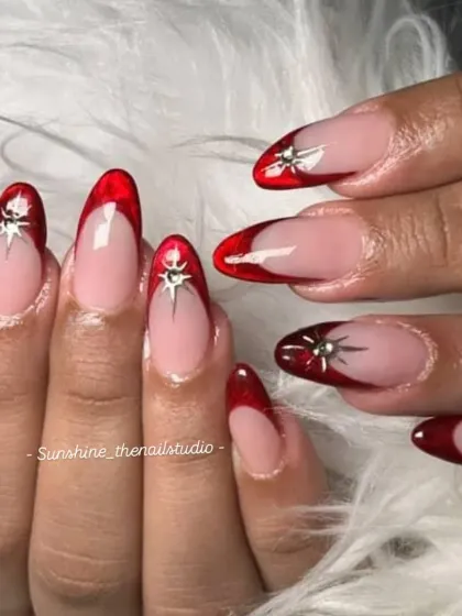 Another shot of the glossy red jelly French with a chrome star.