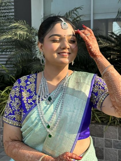 The bride basking in the sunlight, her skin glowing. The soft makeup look is perfect for a daytime event.