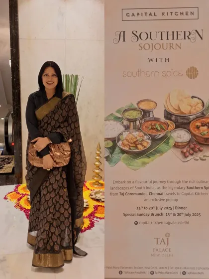 Attending a South Indian food pop-up at Taj Palace. I chose to wear a classic black and gold printed saree to honor the theme of the event, creating a cohesive story.