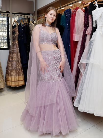 A full-length view of a client looking elegant in a rented fish-cut lehenga, showing how my outfits cater to different body types and styles.
