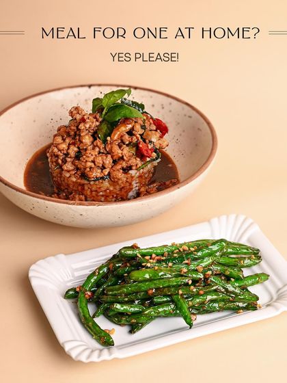 A perfect meal for one. This combo features my savory Chicken Krapow served alongside a plate of wok-tossed green beans for a complete and satisfying dinner.