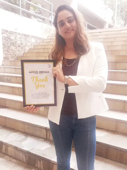 Holding this 'Thank You' frame from Mood Indigo at IIT Bombay. With my college grades, I joked I'd never get in the gate, but following my passion brought me here.