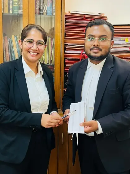 A female advocate from our team congratulates Advocate Amit Kumar. Our firm values the contributions of all its members and promotes a culture of mutual respect and encouragement.