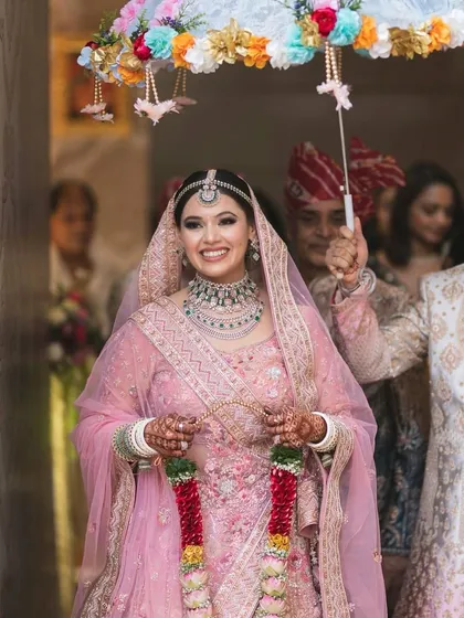 A happy bride on her wedding day. This soft, pretty makeup is a great example of a look that enhances natural beauty for any important occasion.