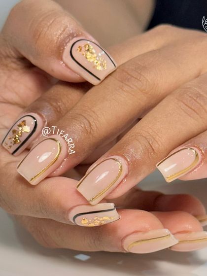 A full view of the simple yet glamorous set, showing the combination of gold chrome borders and gold foil accents.