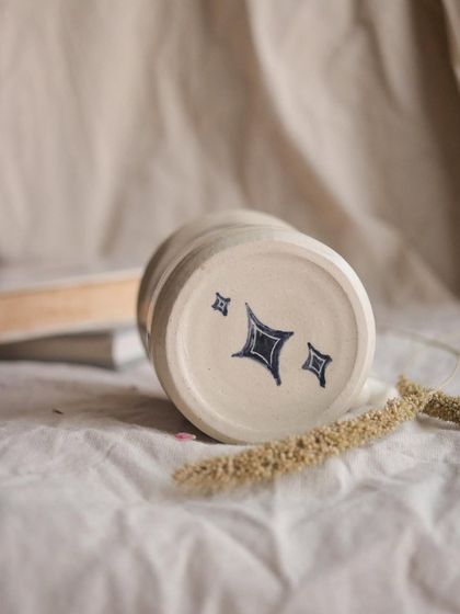 Even the bottom of my pieces gets special attention. Here you can see the little star details I added to the base of the sgraffito mug, a hidden surprise for the owner.