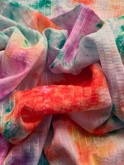 A rainbow of colors on our tie-dye tabby silk. This fabric is pure joy, with subtle sequin stripes that catch the light beautifully.