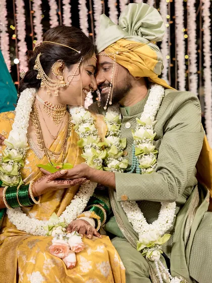 That smile says it all. A beautiful candid moment between a Maharashtrian couple during their wedding.