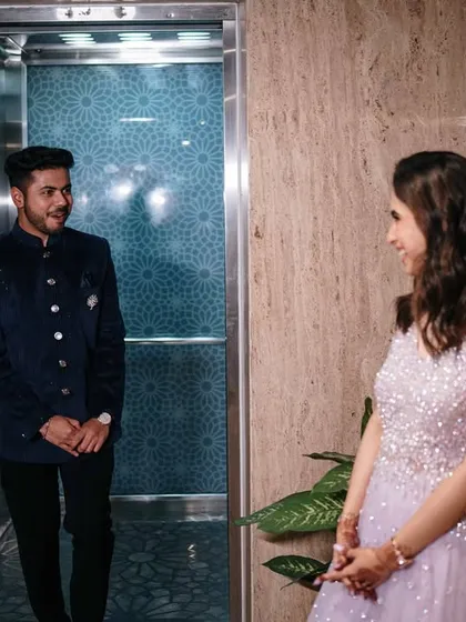 The first look. Capturing the groom's expression as he sees his bride for the first time at their engagement, a story told in a single glance.