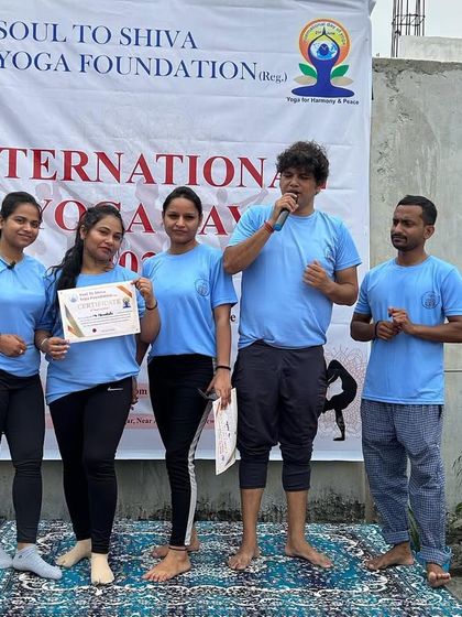 Awarding certificates to participants during our International Yoga Day celebration. We celebrate every milestone on this journey.