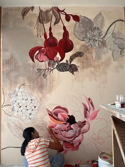 Me in my element, working on the 'Native Grace' mural. On World Art Day, I celebrate the strange and beautiful journey of being an artist.