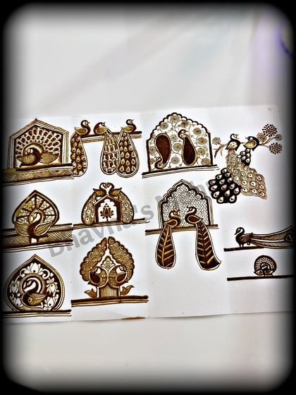 A full sheet of peacock motif drills. This is the homework that leads to beautiful results on the skin.