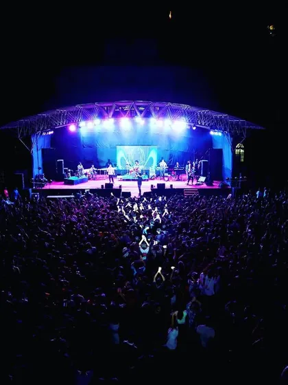 A packed house for a live concert. I managed the entire production, including the large domed stage truss, a powerful sound system to cover the entire ground, and a light show that energized thousands of fans.