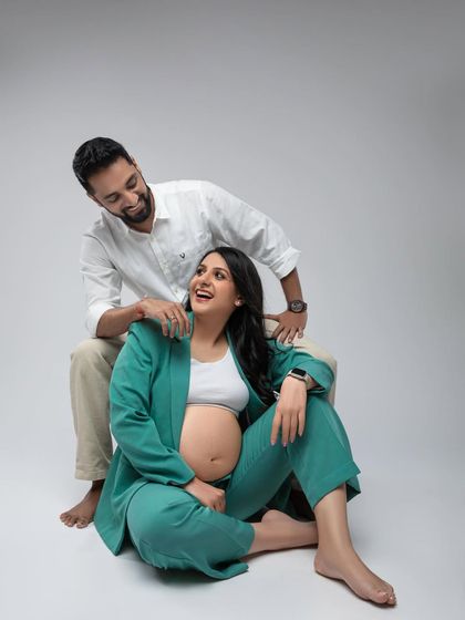 A beautiful, interactive moment captured between the couple. These candid shots are often the most cherished.