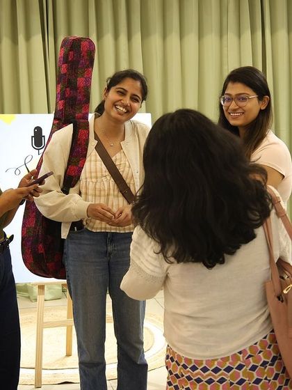Artists and audience members mingling and connecting after a show.