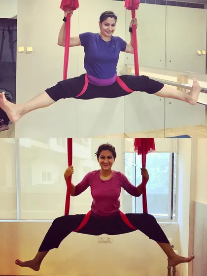 Students working on their aerial splits. The hammock supports your body weight, allowing you to safely work on increasing your flexibility over time.