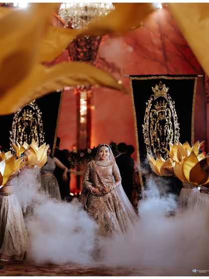 A collection of professional shots of my bride Shachi. Her dusty rose lehenga with a long trail was pure magic. We did a soft glam look with a subtle smokey eye to match the grandeur.