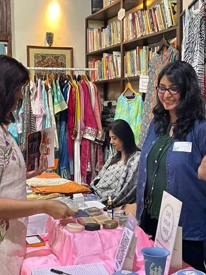 A lovely moment of connection with customers at the Philo Fair. These early experiences helped shape the community-focused brand that One Pour Tree is today.