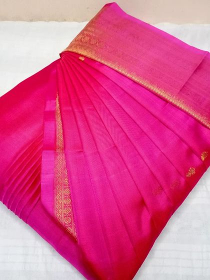The struggle to drape a saree ends here. This bright pink one is pre-draped and ready to help you flaunt your style like never before.