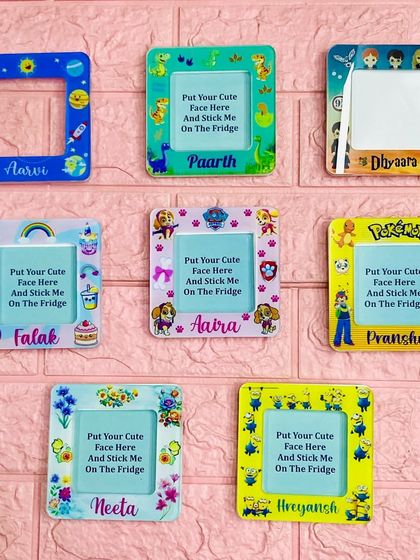 I also make these fun, themed acrylic photo frame magnets for kids. You can choose from themes like Pokémon, Paw Patrol, or space and get them personalized with a name.