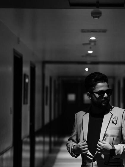 An atmospheric shot in a hotel corridor. It's about good vibes, big dreams, and self-love.