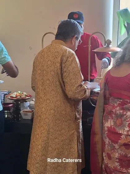 Guests enjoying the wide selection at our buffet during a naming ceremony. We keep our serving dishes well-stocked so no one has to wait.