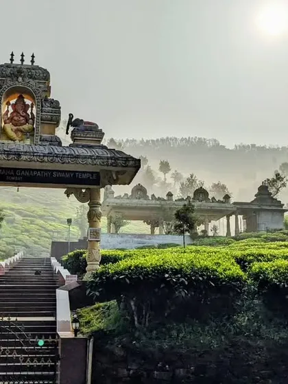 The serene Samse Ganapati temple, nestled amidst sprawling tea estates. We often visit this peaceful spot as part of our Nethravathi itinerary.